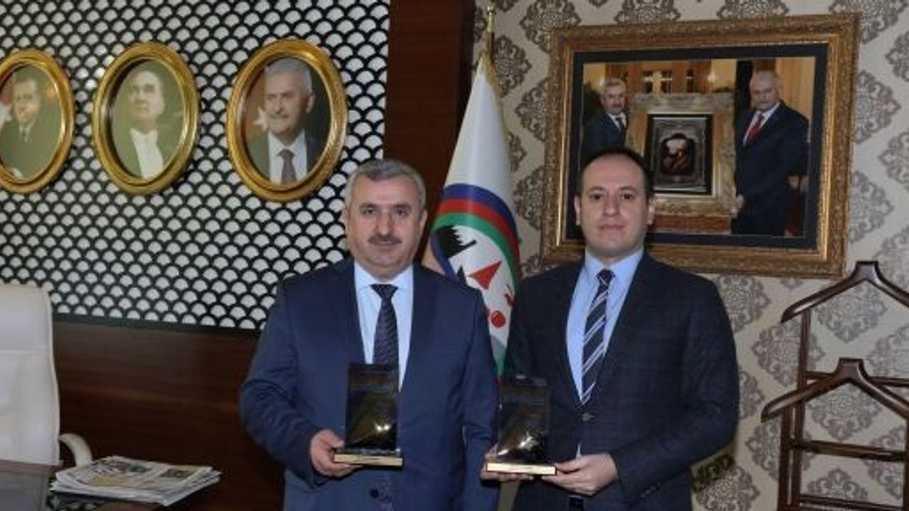 BAŞKAN BARAN'A İKİ ÖDÜL BİRDEN