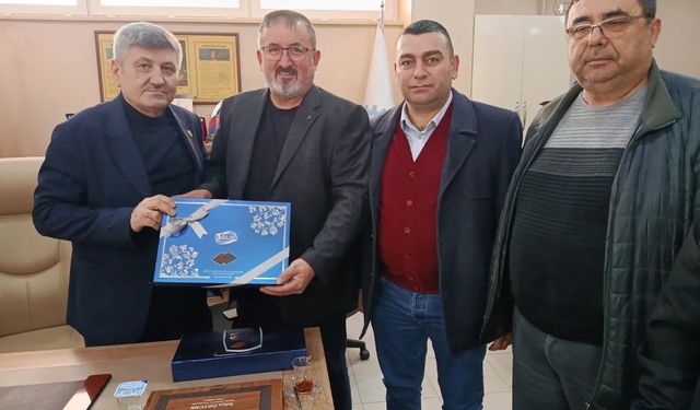 Muhtarlardan Başkan Öztürk’e Tebrik